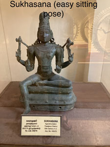 Ancient bronze and stone statues of gods & goddesses in yoga poses